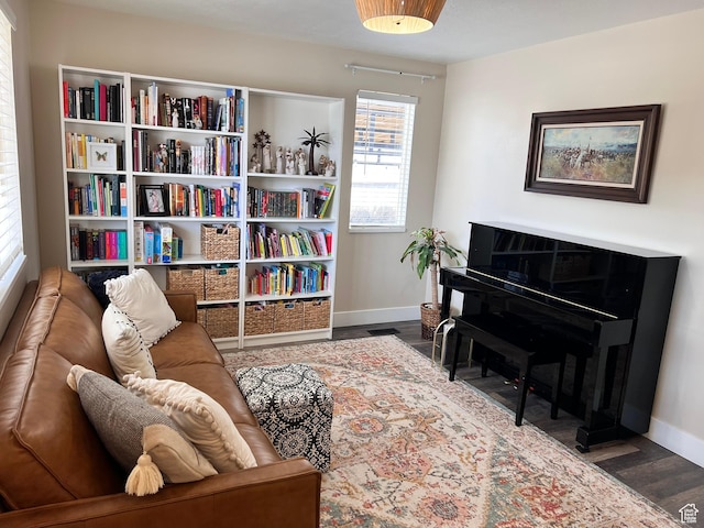 7777 N Mountain Ash Way, Eagle Mountain, UT 84005 - living area with baseboards and wood finished floors
