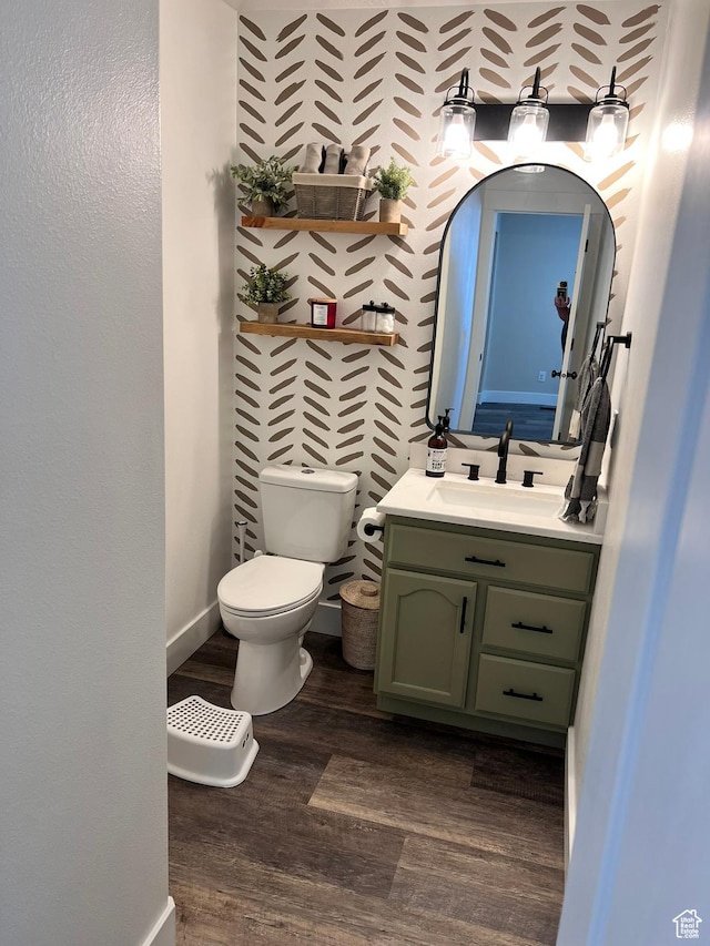 7777 N Mountain Ash Way, Eagle Mountain, UT 84005 - half bath with toilet, vanity, wood finished floors, and baseboards