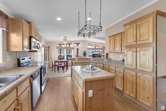 19185 N 11250 E, Mount Pleasant, UT 84647 - kitchen with light countertops, appliances with stainless steel finishes, ceiling fan, and light brown cabinets