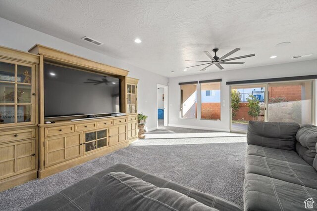 1976 E 1200th Cir N, St George, UT 84770 - living room featuring visible vents, baseboards, ceiling fan, carpet, and recessed lighting