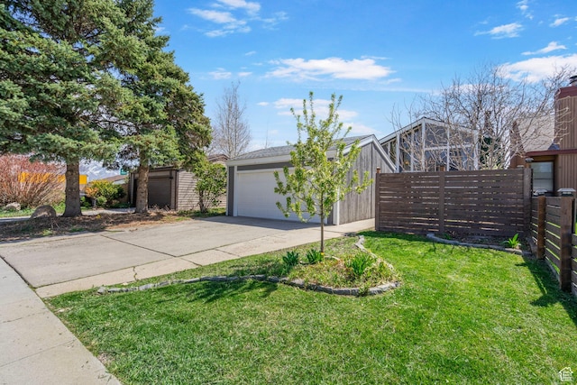 exterior space featuring fence and a yard