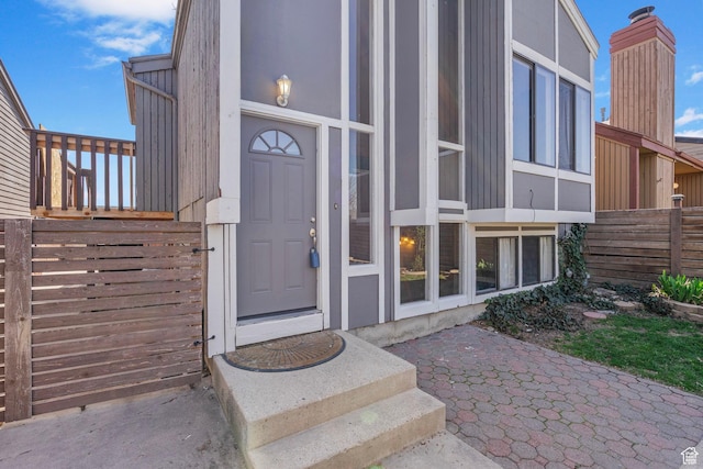 property entrance featuring fence