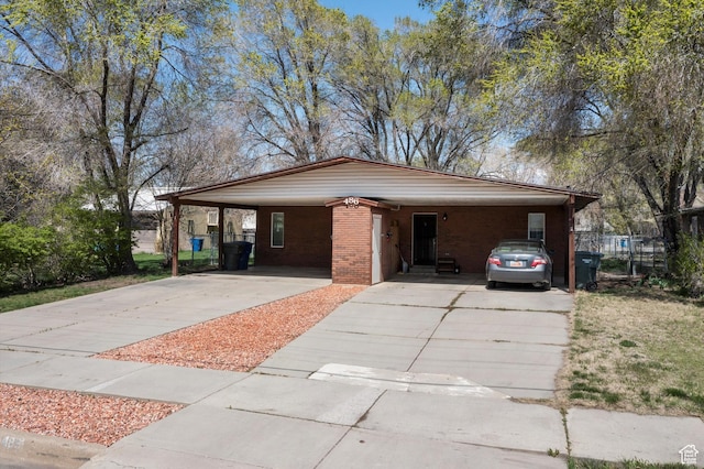 486 13th St, Ogden, UT 84404 - single story home featuring fence, an attached carport, and concrete driveway