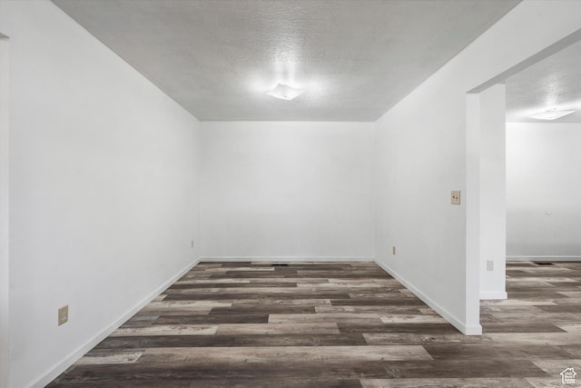 486 13th St, Ogden, UT 84404 - empty room featuring baseboards, wood finished floors, and a textured ceiling