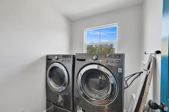 laundry area featuring laundry area and separate washer and dryer