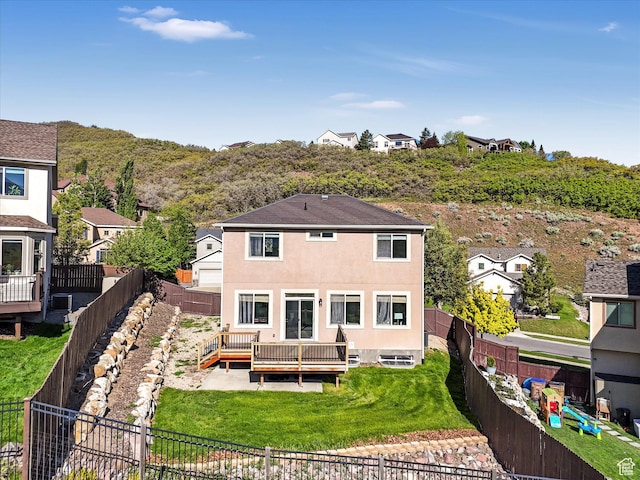 14939 S Winged Bluff Ln, Draper, UT 84020 - rear view of house featuring a wooden deck, stucco siding, and a residential view
