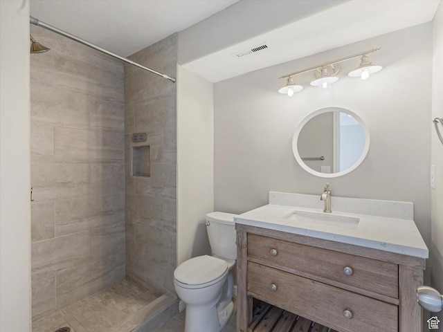 14939 S Winged Bluff Ln, Draper, UT 84020 - full bathroom with vanity, toilet, and a tile shower