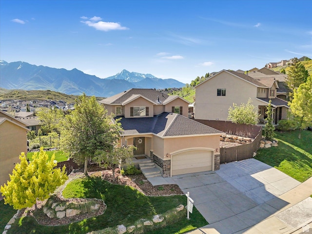 14939 S Winged Bluff Ln, Draper, UT 84020 - view of front of house with stucco siding, a garage, stone siding, concrete driveway, and a residential view