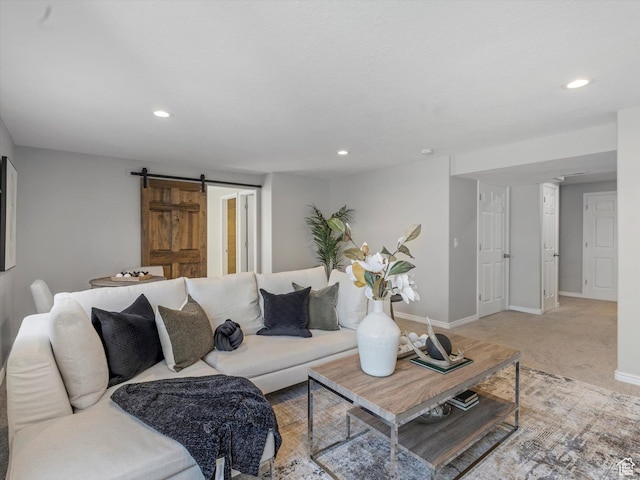 14939 S Winged Bluff Ln, Draper, UT 84020 - living room with a barn door, recessed lighting, baseboards, and light carpet