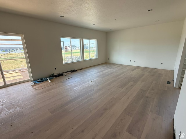 2405 W 3200 N, Farr West, UT 84404 - spare room featuring light wood-style floors and recessed lighting