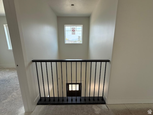 2405 W 3200 N, Farr West, UT 84404 - staircase featuring baseboards and a textured ceiling