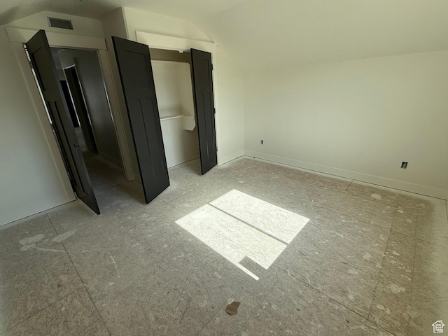 2405 W 3200 N, Farr West, UT 84404 - unfurnished bedroom featuring vaulted ceiling and baseboards