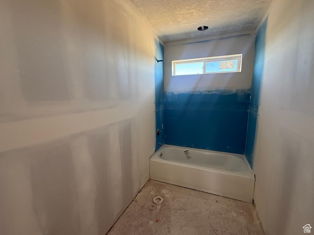 2405 W 3200 N, Farr West, UT 84404 - bathroom featuring shower / bath combination and a textured ceiling