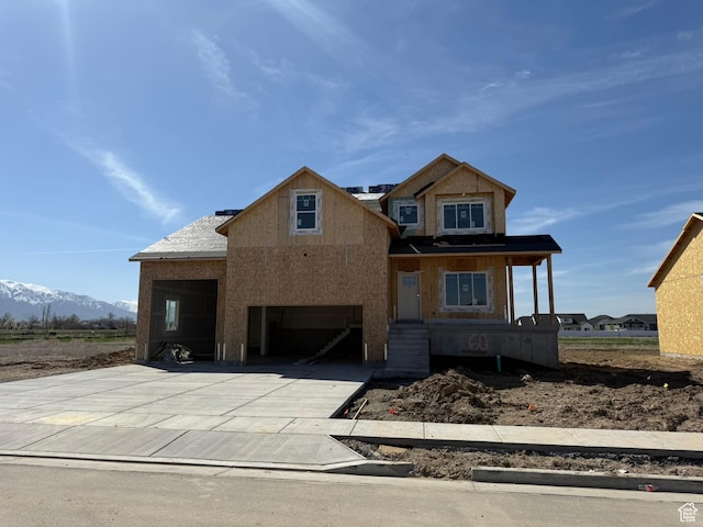 2405 W 3200 N, Farr West, UT 84404 - property under construction featuring a mountain view, an attached garage, and concrete driveway