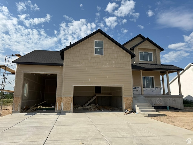 2405 W 3200 N, Farr West, UT 84404 - view of front of house with stairway, covered porch, and driveway