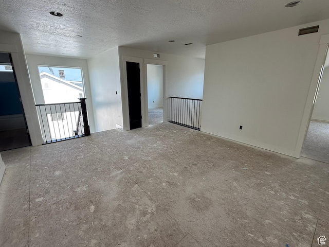 2405 W 3200 N, Farr West, UT 84404 - empty room with a textured ceiling