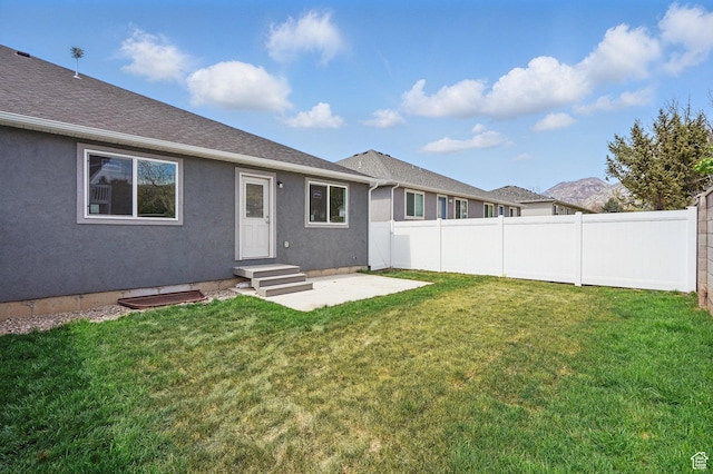 1614 N 160 E Unit 2, Orem, UT 84057 - back of property with a yard, fence, a patio, and stucco siding