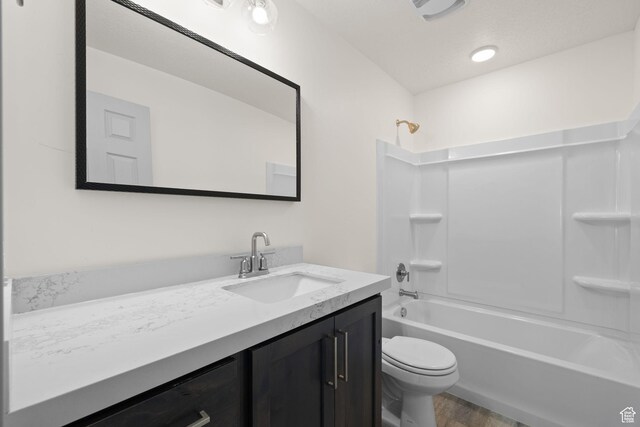 1614 N 160 E Unit 2, Orem, UT 84057 - bathroom with toilet, wood finished floors, vanity, and bathtub / shower combination
