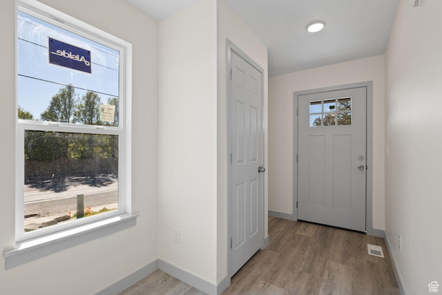 1614 N 160 E Unit 2, Orem, UT 84057 - foyer with visible vents, light wood-style flooring, and baseboards