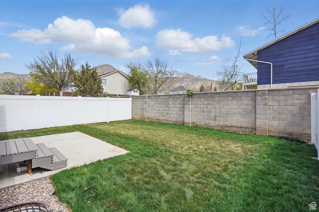 1614 N 160 E Unit 2, Orem, UT 84057 - view of yard featuring a patio area, a fenced backyard, and a mountain view