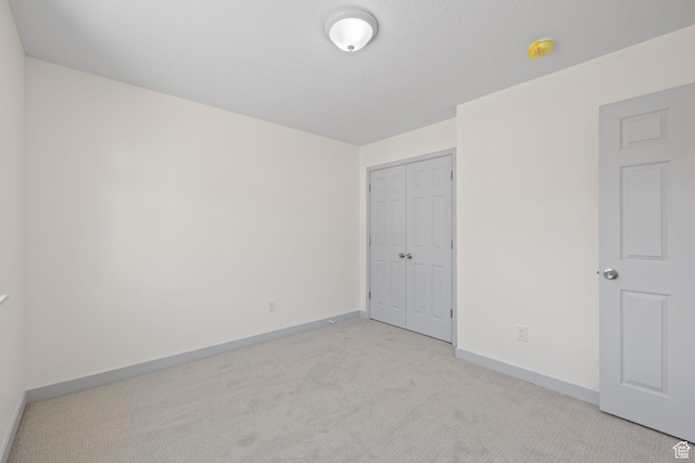 1614 N 160 E Unit 2, Orem, UT 84057 - unfurnished bedroom with a closet, carpet flooring, and baseboards