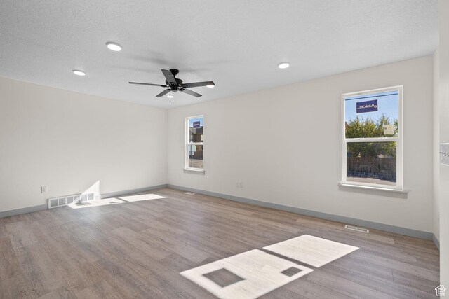 1614 N 160 E Unit 2, Orem, UT 84057 - spare room featuring a ceiling fan, visible vents, recessed lighting, wood finished floors, and baseboards