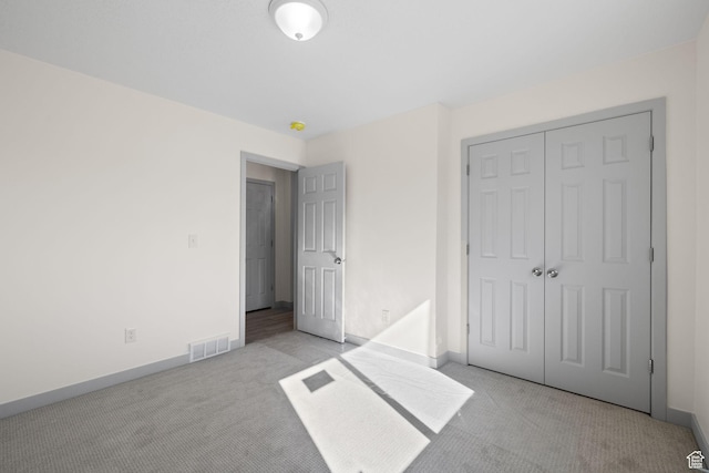 1614 N 160 E Unit 2, Orem, UT 84057 - unfurnished bedroom with a closet, carpet flooring, visible vents, and baseboards