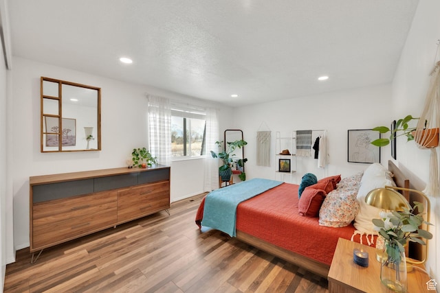 4338 S 1100 W Unit 36D, Taylorsville, UT 84123 - bedroom with recessed lighting and wood finished floors