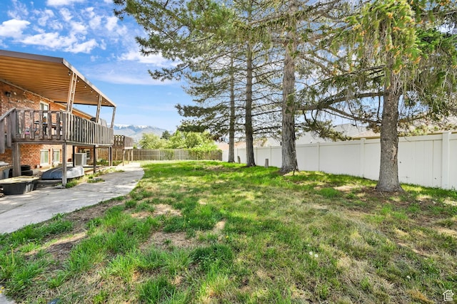 1705 W 4575 S, Roy, UT 84067 - fenced backyard featuring a mountain view and a patio