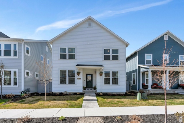 view of front of house with a front lawn