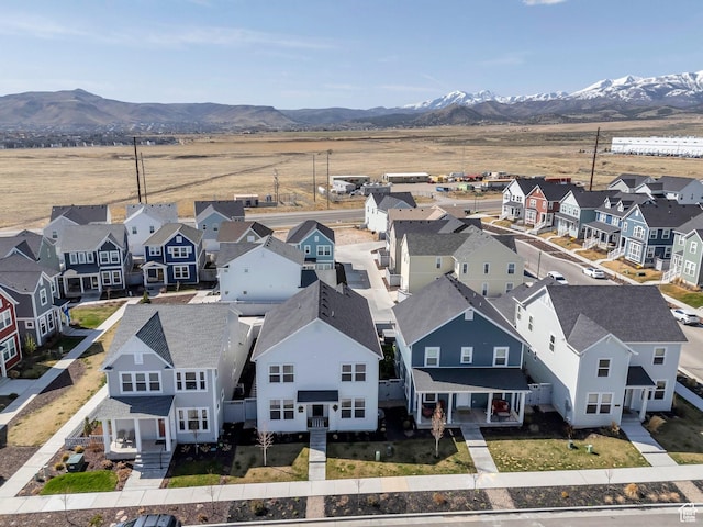 aerial view featuring a residential view and a mountain view