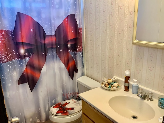 162 S Center St, Elsinore, UT 84724 - bathroom featuring toilet, vanity, and wallpapered walls