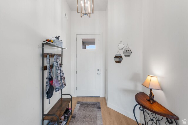 4898 N 10 E, Enoch, UT 84721 - entryway with a chandelier, wood finished floors, baseboards, and visible vents