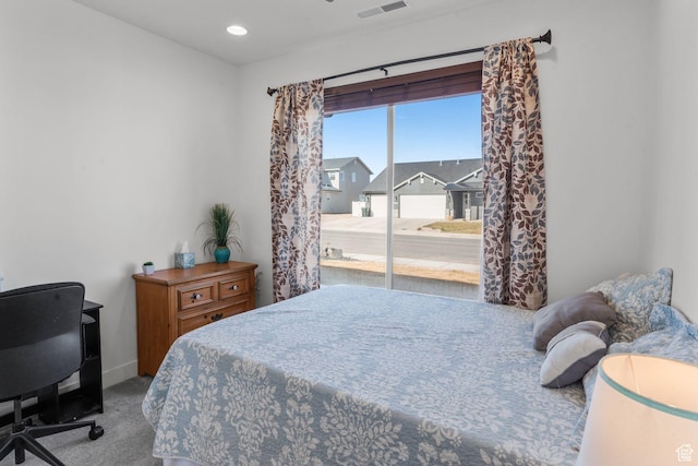 4898 N 10 E, Enoch, UT 84721 - carpeted bedroom with recessed lighting, visible vents, and access to exterior