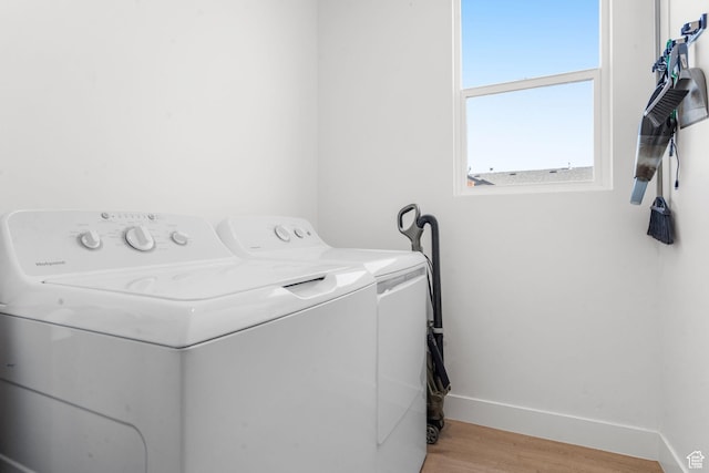 4898 N 10 E, Enoch, UT 84721 - washroom featuring washer and dryer, laundry area, baseboards, and light wood-type flooring