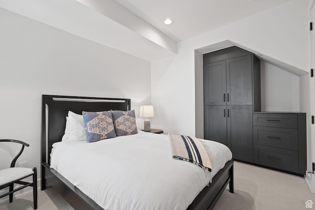 bedroom featuring light colored carpet and recessed lighting