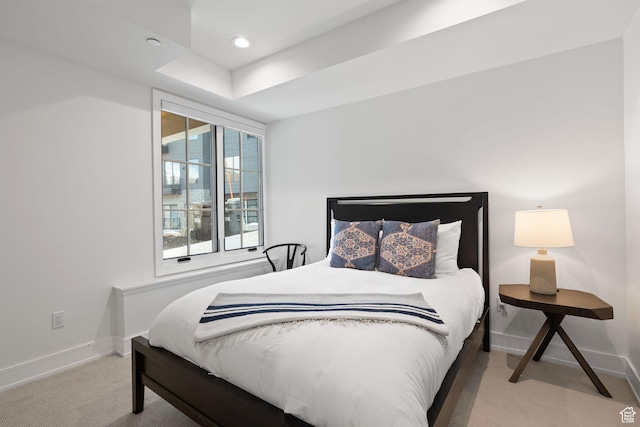carpeted bedroom with baseboards and recessed lighting