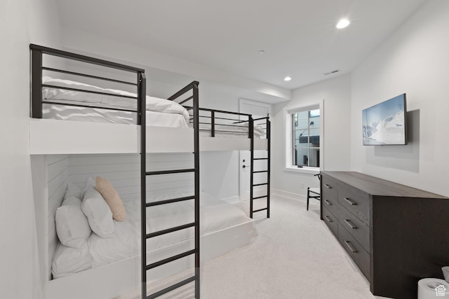bedroom with baseboards, recessed lighting, and carpet