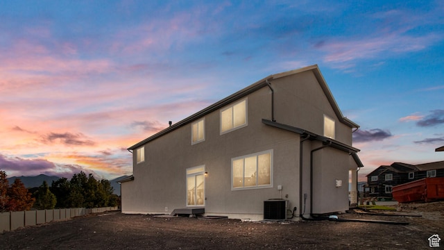 162 N Mia Cv Unit 16, Saratoga Springs, UT 84045 - back of house with cooling unit and stucco siding