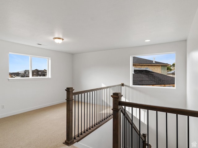 162 N Mia Cv Unit 16, Saratoga Springs, UT 84045 - hallway featuring an upstairs landing, baseboards, healthy amount of natural light, carpet, and recessed lighting