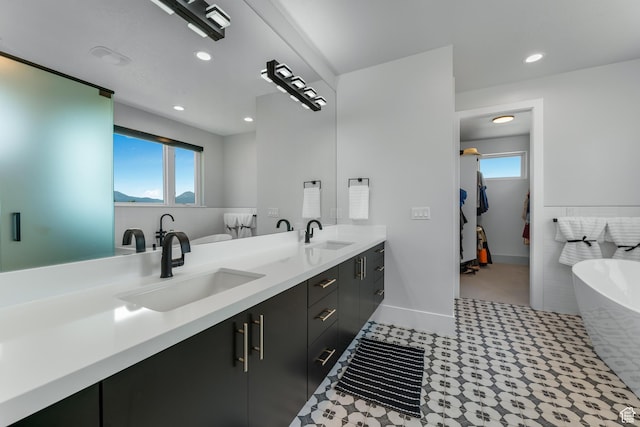 3131 E Lindsay Spring Rd, Heber City, UT 84032 - full bath with double vanity, a sink, and a healthy amount of sunlight