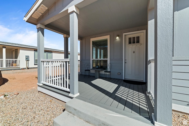 entrance to property with a porch