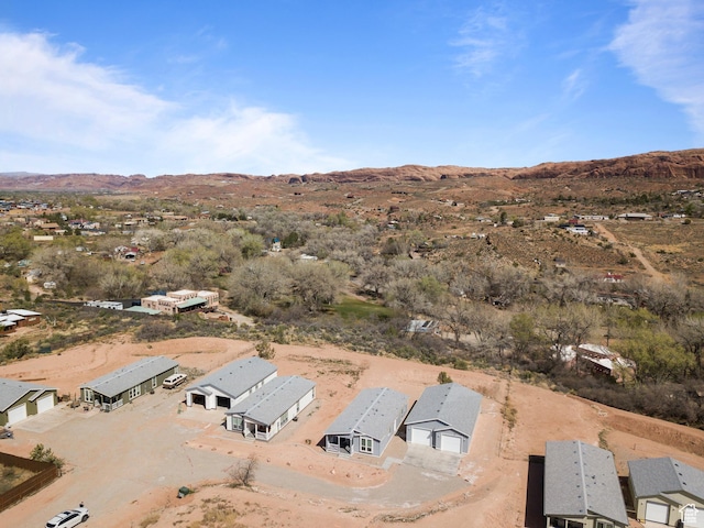birds eye view of property with a residential view and a mountain view