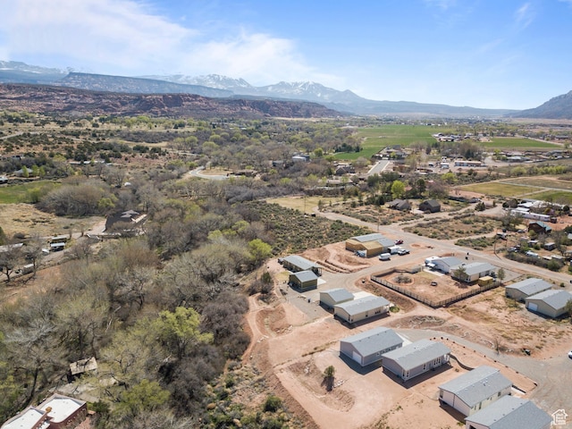 drone / aerial view featuring a mountain view