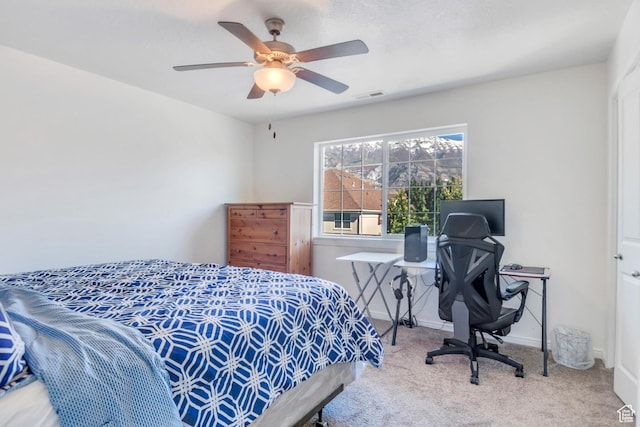 bedroom with visible vents, ceiling fan, baseboards, and carpet floors