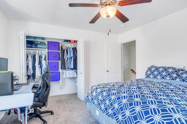 bedroom with a closet, ceiling fan, baseboards, and carpet