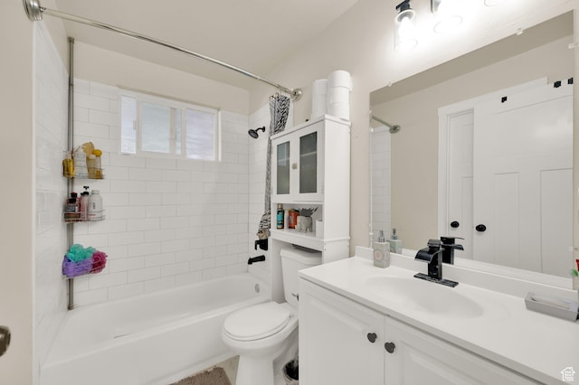 full bath with toilet, vanity, and shower / bathing tub combination