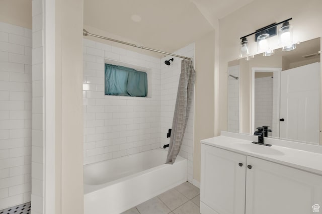 full bath featuring vanity, tile patterned floors, shower / bath combo with shower curtain, and visible vents