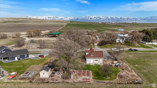 bird's eye view featuring a rural view and a mountain view