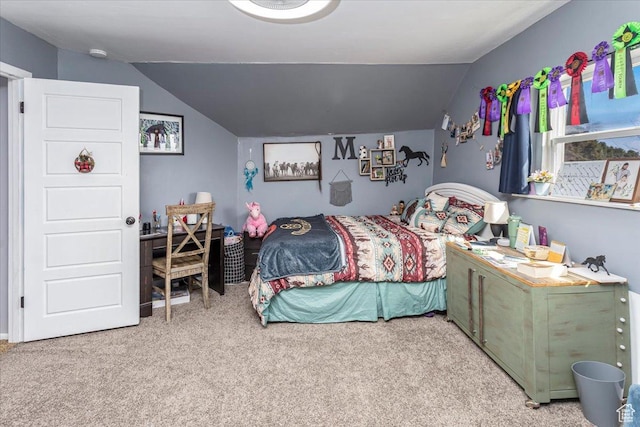 bedroom featuring carpet and vaulted ceiling
